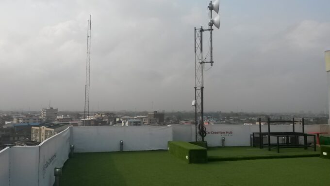 Exterior of CcHub (Co‑Creation Hub) building on a street in Yaba, Lagos, Nigeria