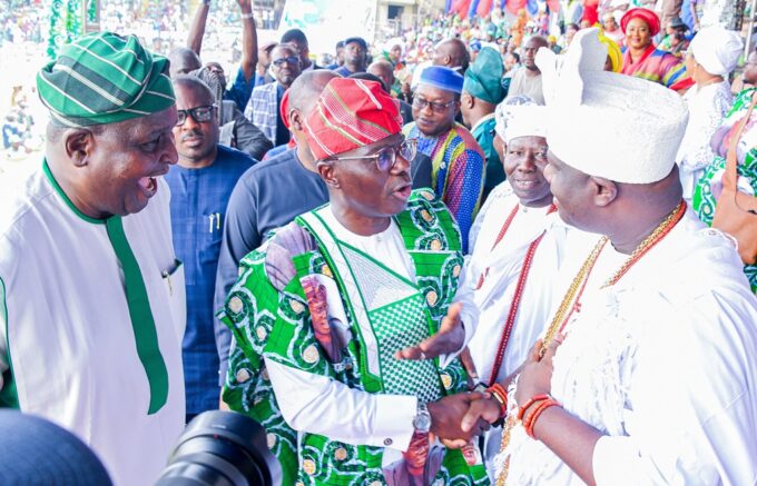Otunba Olusegun Runsewe and Lagos governor Babajide Sanwo-Olu greeting the Ooni of Ife at the EkoNafest 2022 opening