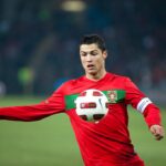 Cristiano Ronaldo wearing Portugal national team kit on the pitch during a match