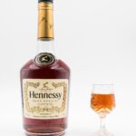 A bottle of Hennessy V.S. Cognac standing upright on a white background.