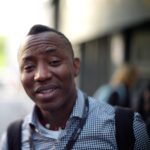Omoyele Sowore, mid-shot portrait at an event, wearing a dark jacket and white shirt