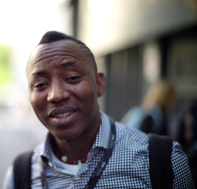 Omoyele Sowore, mid-shot portrait at an event, wearing a dark jacket and white shirt